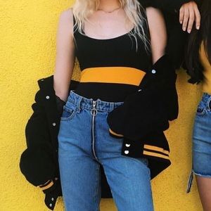 LF black and yellow body suit